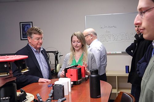 Megan Smith demonstrating a 3D-printed mechanism prototype in the Northrop Grumman makerspace