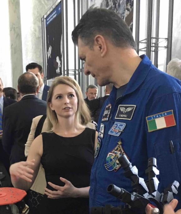 Megan Smith speaking with an astronaut at NASA Technology Day on Capitol Hill